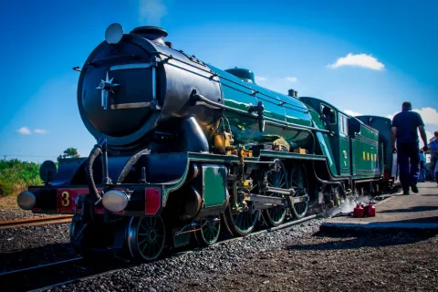 The Trio by the train